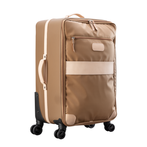 Large 360 wheeled luggage diagonal view in Color 'Saddle Coated Canvas'