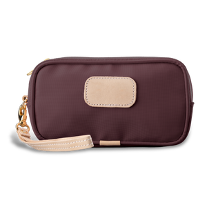 Wristlet - Burgundy Coated Canvas Front Angle in Color 'Burgundy Coated Canvas'