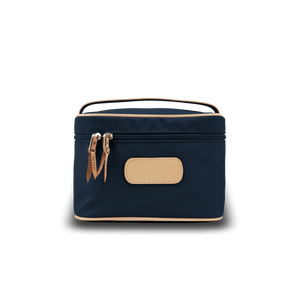 Makeup Case - Navy Coated Canvas Front Angle in Color 'Navy Coated Canvas'