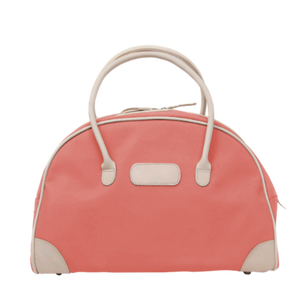 SS Carry On - Coral Coated Canvas Front Angle in Color 'Coral Coated Canvas'