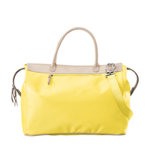 Load image into Gallery viewer, Burleson Bag - Lemon Coated Canvas Front Angle in Color &#39;Lemon Coated Canvas&#39;
