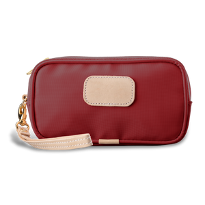 Wristlet - Red Coated Canvas Front Angle in Color 'Red Coated Canvas'