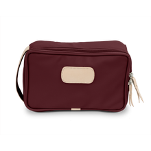 Load image into Gallery viewer, Small Travel Kit - Burgundy Coated Canvas Front Angle in Color &#39;Burgundy Coated Canvas&#39;
