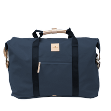 Load image into Gallery viewer, Weekender - Navy Coated Canvas Front Angle in Color &#39;Navy Coated Canvas&#39;
