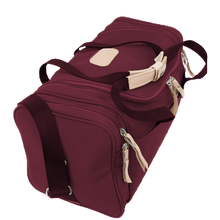 Load image into Gallery viewer, Small Square Duffel - Burgundy Coated Canvas Front Angle in Color &#39;Burgundy Coated Canvas&#39;
