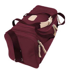 Small Square Duffel - Burgundy Coated Canvas Front Angle in Color 'Burgundy Coated Canvas'