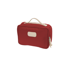 Load image into Gallery viewer, Large Travel Kit - Red Coated Canvas Front Angle in Color &#39;Red Coated Canvas&#39;
