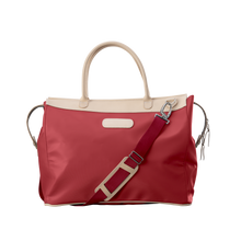Load image into Gallery viewer, Burleson Bag - Red Coated Canvas Front Angle in Color &#39;Red Coated Canvas&#39;
