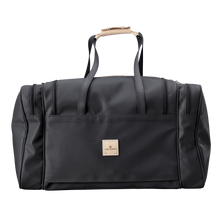 Load image into Gallery viewer, Large Square Duffel - Black Coated Canvas Front Angle in Color &#39;Black Coated Canvas&#39;

