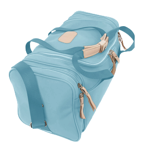 Small Square Duffel - Ocean Blue Coated Canvas Front Angle in Color 'Ocean Blue Coated Canvas'