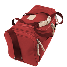 Load image into Gallery viewer, Small Square Duffel - Red Coated Canvas Front Angle in Color &#39;Red Coated Canvas&#39;
