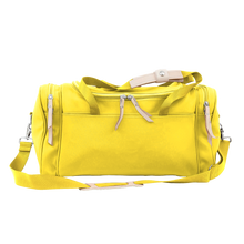 Load image into Gallery viewer, Small Square Duffel - Lemon Coated Canvas Front Angle in Color &#39;Lemon Coated Canvas&#39;

