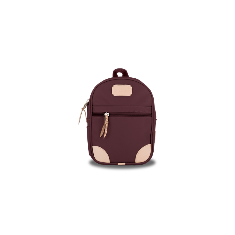 Mini Backpack - Burgundy Coated Canvas Front Angle in Color 'Burgundy Coated Canvas'