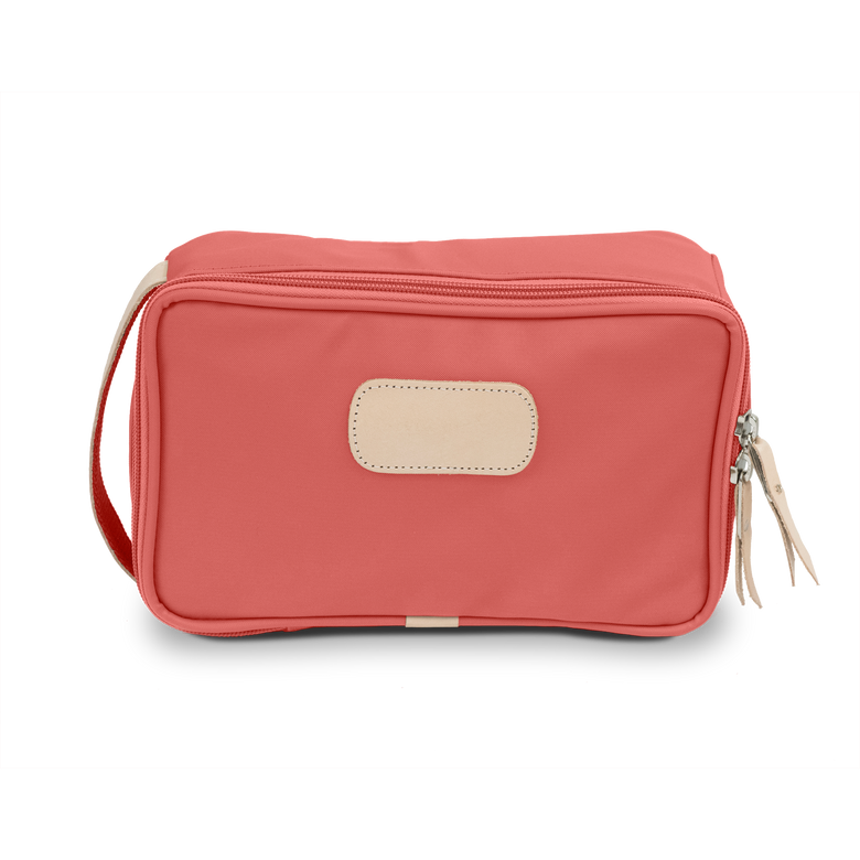 Small Travel Kit - Coral Coated Canvas Front Angle in Color 'Coral Coated Canvas'