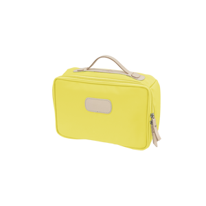 Large Travel Kit - Lemon Coated Canvas Front Angle in Color 'Lemon Coated Canvas'