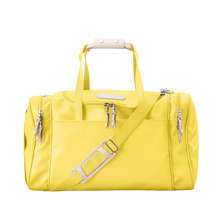 Load image into Gallery viewer, Medium Square Duffel - Lemon Coated Canvas Front Angle in Color &#39;Lemon Coated Canvas&#39;
