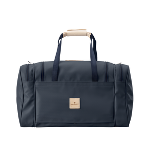 Medium Square Duffel - Navy Coated Canvas Front Angle in Color 'Navy Coated Canvas'