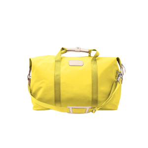Weekender - Lemon Coated Canvas Front Angle in Color 'Lemon Coated Canvas'