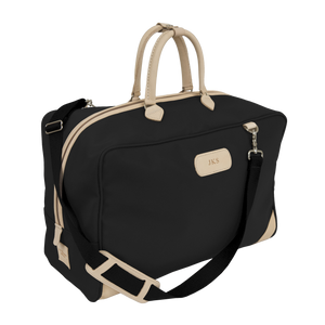 Coachman - Black Coated Canvas Front Angle in Color 'Black Coated Canvas'