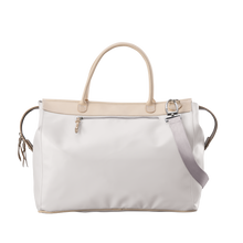 Load image into Gallery viewer, Burleson Bag - White Coated Canvas Front Angle in Color &#39;White Coated Canvas&#39;
