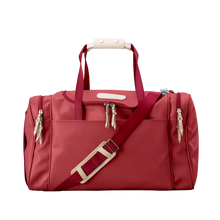 Load image into Gallery viewer, Medium Square Duffel - Red Coated Canvas Front Angle in Color &#39;Red Coated Canvas&#39;
