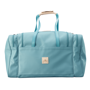 Large Square Duffel - Ocean Blue Coated Canvas Front Angle in Color 'Ocean Blue Coated Canvas'