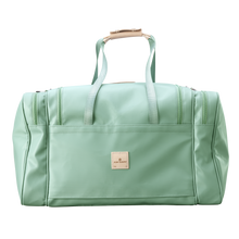 Load image into Gallery viewer, Large Square Duffel - Mint Coated Canvas Front Angle in Color &#39;Mint Coated Canvas&#39;
